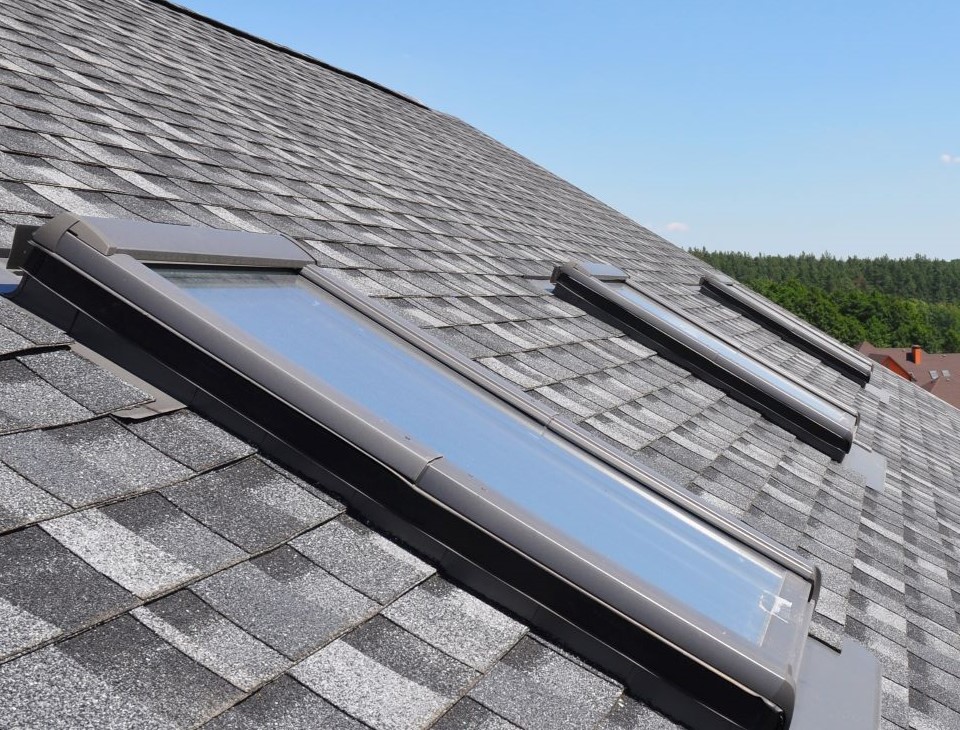 Newly installed skylights on residential roof